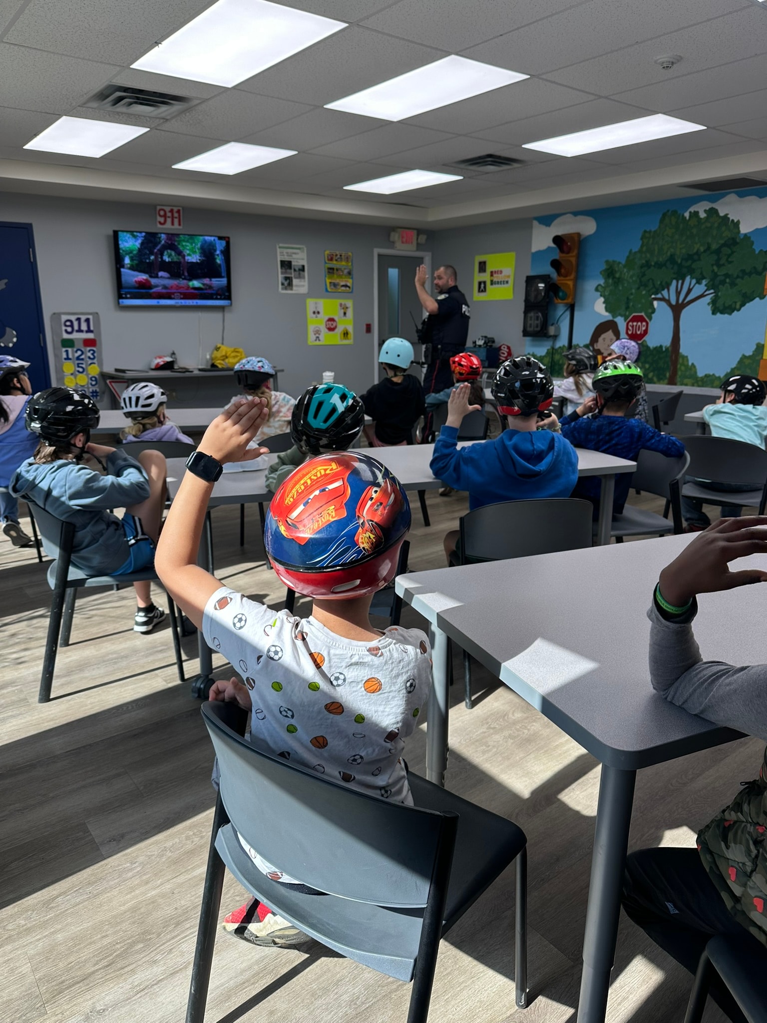 Children participating in a safety education classroom activity
